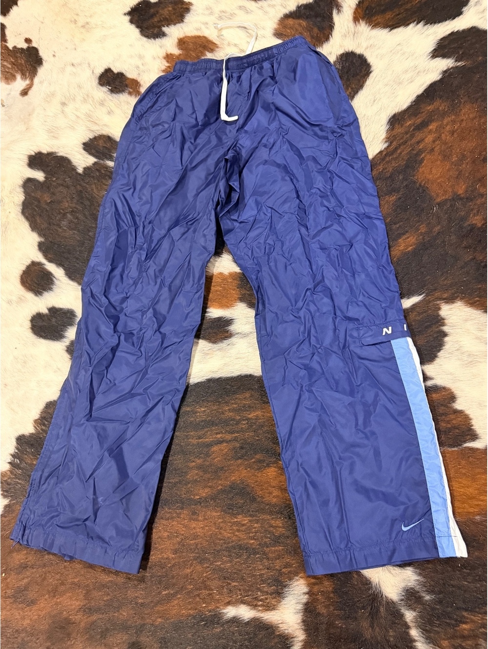 Nike Men's Medium Navy Blue Athletic Track Pants with Light Blue Stripe